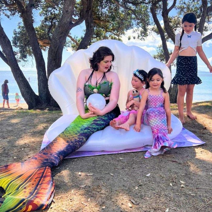 MSD004 – Mermaid on Orewa Beach attracts a crowd of young party goers